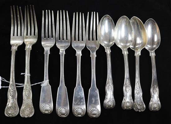 Two pairs of Scottish silver shell pattern table forks, four Kings pattern dessert spoons and two table forks, Georgian and later